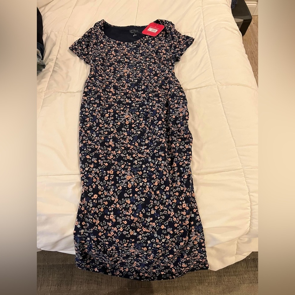 Isabel (snug fit) size medium maternity dress.